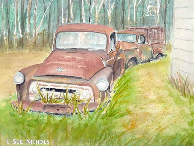 2 old trucks